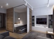 спальное место, спальня в однокомнатной квартире, современный дизайн однокомнатной квартиры, большой телевизор в интерьере